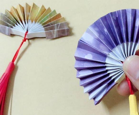 手工折纸扇子如何做简单又美丽？(手工折纸枪教程)